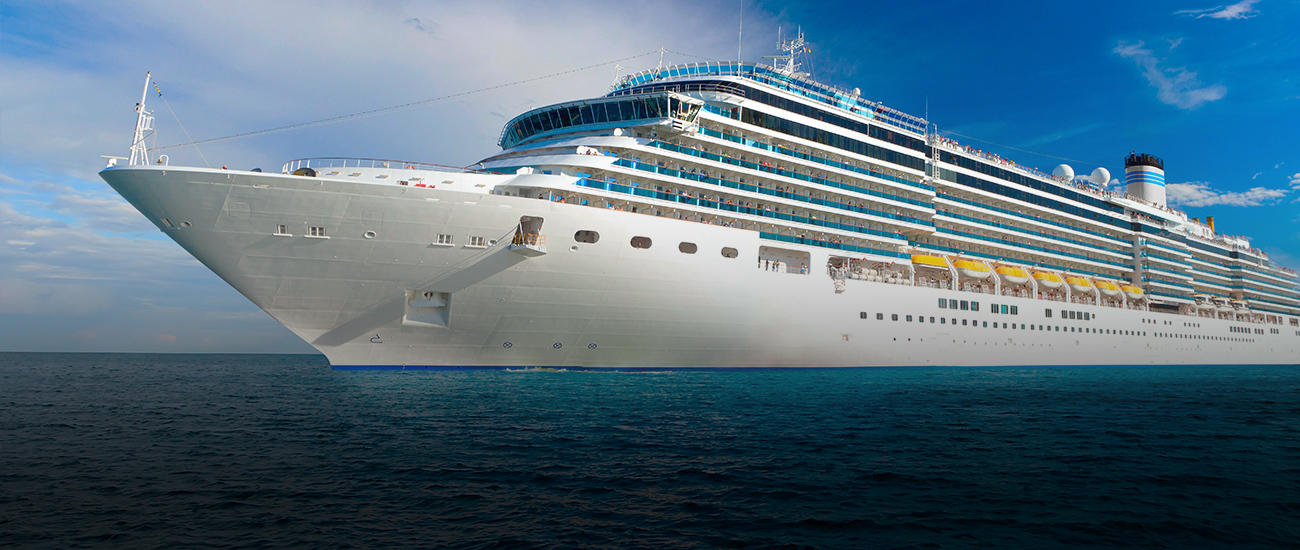 Large cruise ship at sea and cloudy sky on background